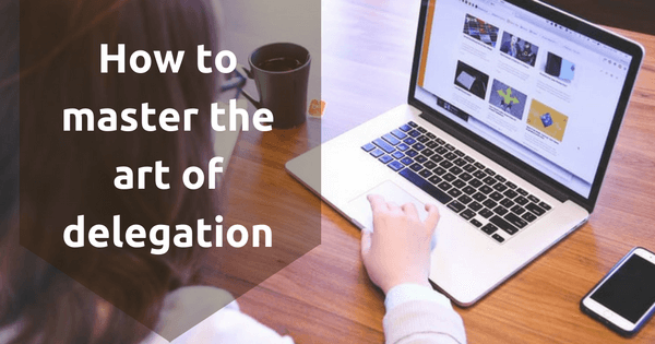 how to master the art of delegation as a personal assistant sits at laptop working with coffee and phone