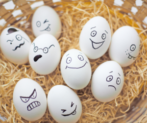 Eggs in a basket with different expressions 
