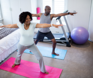 Man and woman exercising as a way of stress management