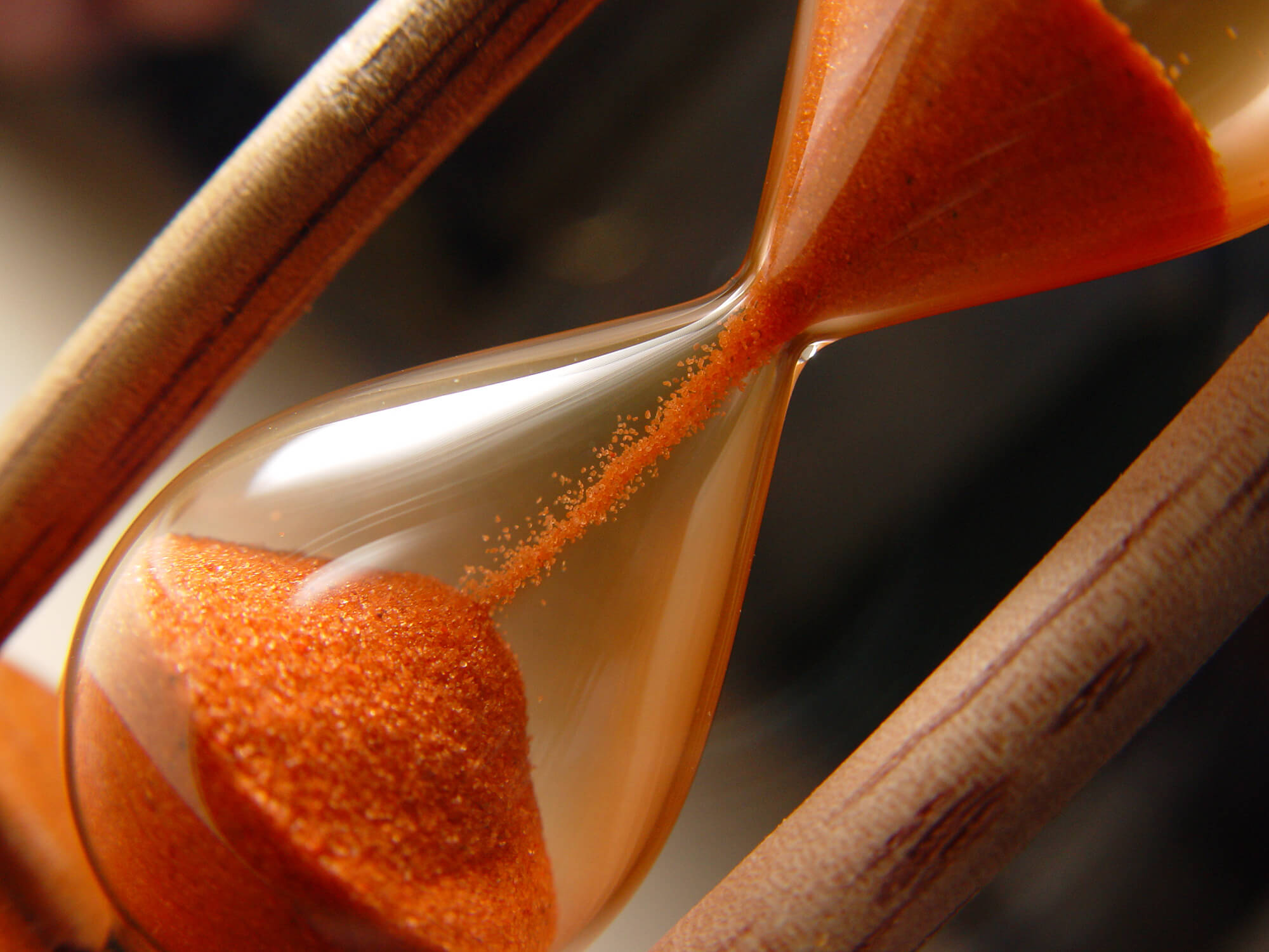 sand falls through the hourglass as time runs out